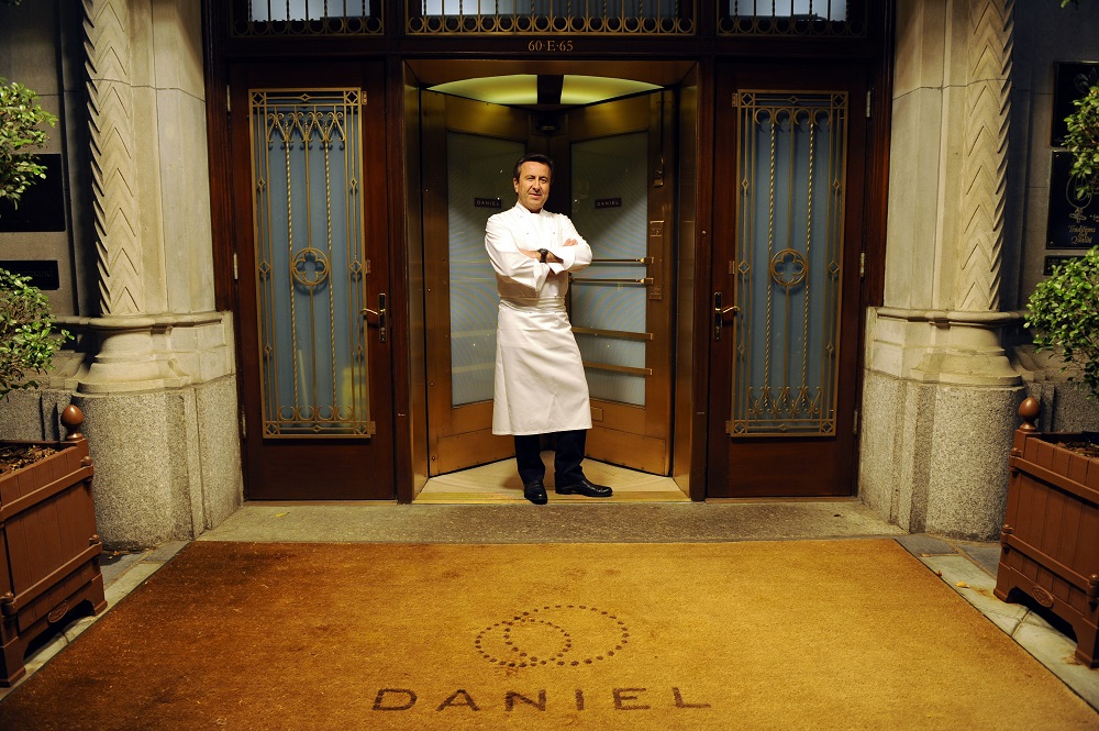 French chef Daniel Boulud poses at the entrance at his flagship restaurant 'Daniel' in New York. u00e2u20acu201d AFP pic