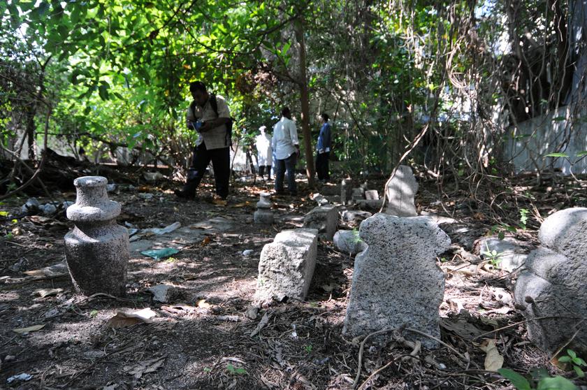 The centuries-old cemetery of the early Indian Muslim settlers in Chulia Street is overgrown with bushes, weeds and trees.