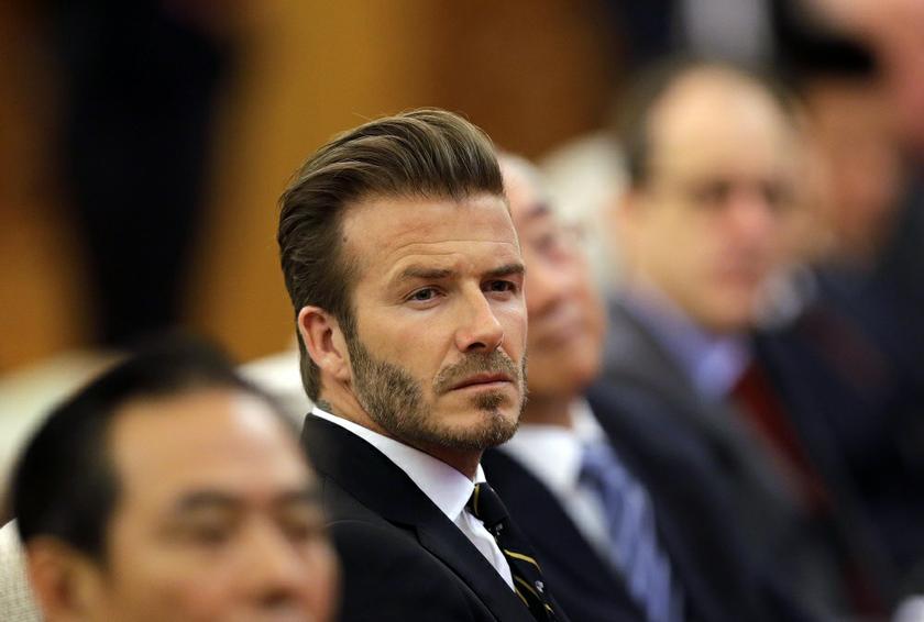 Former captain of England football team David Beckham attends a ceremony at the Great Hall of the People in Beijing April 21, 2014. u00e2u20acu201d Reuters pic