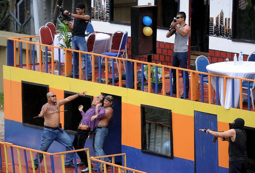 Commandos from the Malaysian Armed Forces give a demonstration to display their readiness for combat at PWTC, during the 14th Defence Services Asia (DSA) 2014 exhibition and conference on April 14, 2014. u00e2u20acu201d Bernama pic