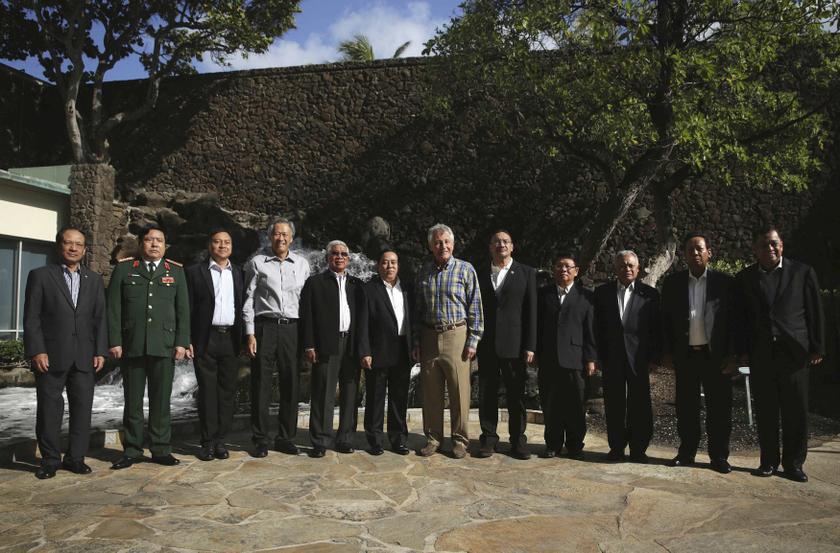 US Secretary of Defense Chuck Hagel (seventh left) participates in the official family photo during a meeting with his Asean counterparts during the US-Asean Defense Forum in Honolulu, Hawaii, April 3, 2014. u00e2u20acu201d Reuters pic