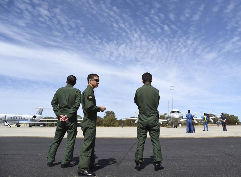 Ground crew watch as a Japan Maritime Self-Defence Force P-3C Orion Aircraft prepares to take off from RAAF Base Pearce to join the search for the missing MAS flight MH370 on April 3, 2014. u00e2u20acu201d Reuters pic