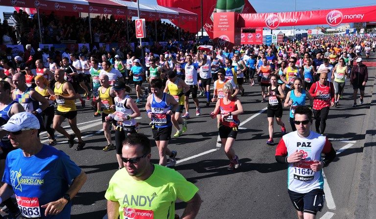 Runners take part in the 2014 London Marathon in Blackheath in southeast London on April 13, 2014. u00e2u20acu201d AFP pic