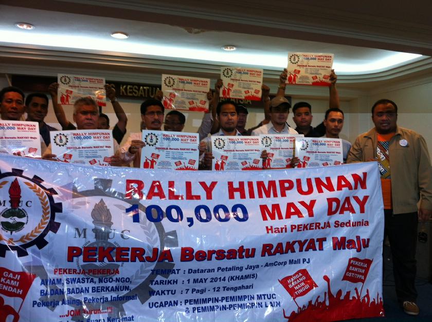 MTUC deputy president Abdullah Sani Abdul Hamid (third left) announces the MTUC May Day rally on April 24, 2014. u00e2u20acu201d Picture by Boo Su-Lyn