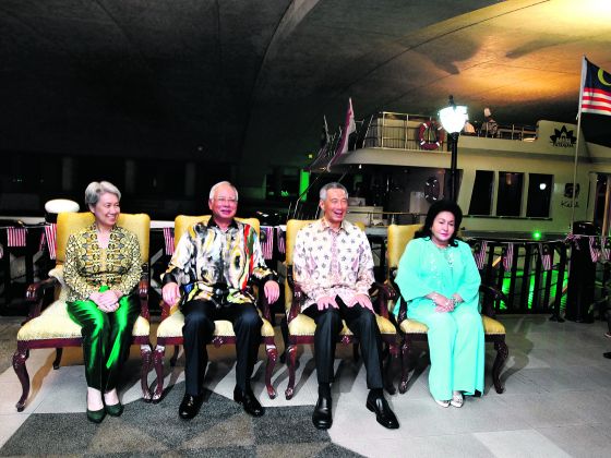 Singapore Prime Minister Lee Hsien Loong (2nd right) and his wife Ho Ching (left) were hosted to a private cruise dinner on Putrajaya Lake by Prime Minister Datuk Ser Najib Razak and his wife Datin Seri Rosmah Mansor April 6 2014. Today Online