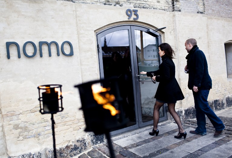 File photo shows people entering the Noma restaurant in Copenhagen, on April 27, 2010, the day after it was chosen for the S. Pellegrino Worlds Best Restaurants Award. u00e2u20acu201d AFP pic