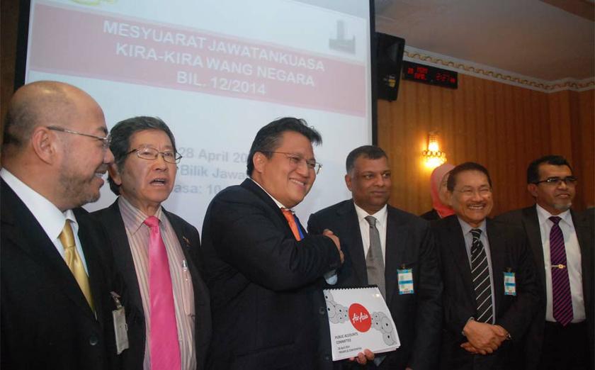 Public Accounts Committee (PAC) Chairman, Datuk Nur Jazlan Mohamed and Group CEO Air Asia Berhad, Tan Sri Dr Tony Fernandes during media briefing at Parliament, Kuala Lumpur, April 28, 2014. u00e2u20acu201d Yusof Mat Isa