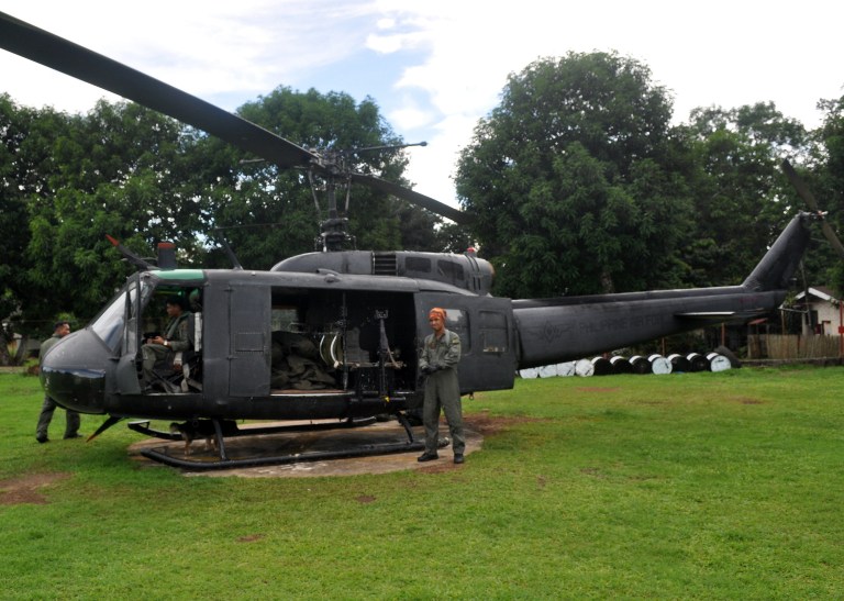 File photo of May 25, 2013 shows a Philippine military helicopter loaded with body bags containing bodies of soldiers killed in a clash with members of Abu Sayyaf group, preparing to take off at a military base in Patikul, Sulu province, in the island of 