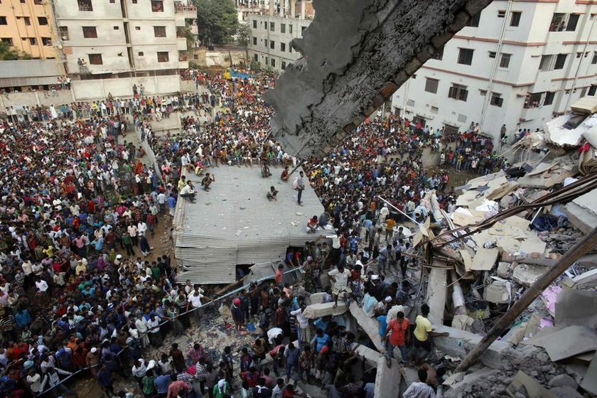 Rescue workers try to rescue trapped garment workers in the Rana Plaza building which collapsed, in Savar, outside Dhaka, in this April 24, 2013 file picture. u00e2u20acu2022 Reuters pic