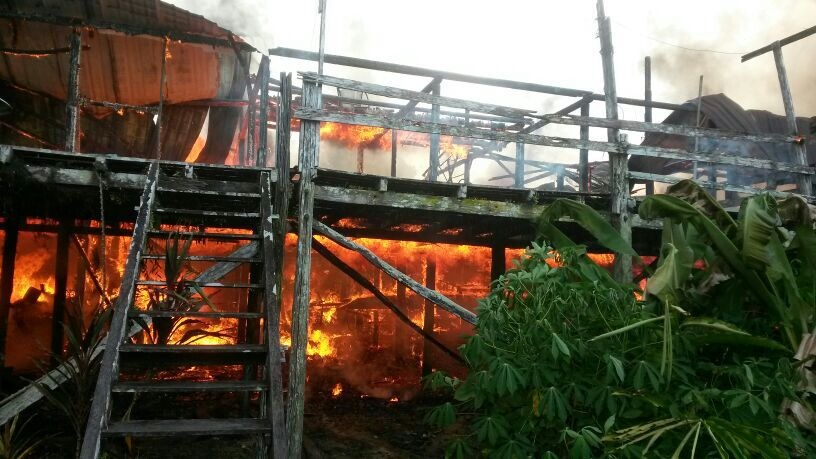 Twenty-two families were left homeless after a fire broke out at a 74-door longhouse in Sibu this morning. u00e2u20acu201d Picture by Nigel Edgarn