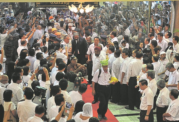The casket bearing the body of Karpal arrives at Dewan Seri Pinang, George Town, April 20, 2014 ahead of the state funeral. u00e2u20acu201d Picture by Sayuti Zainudin