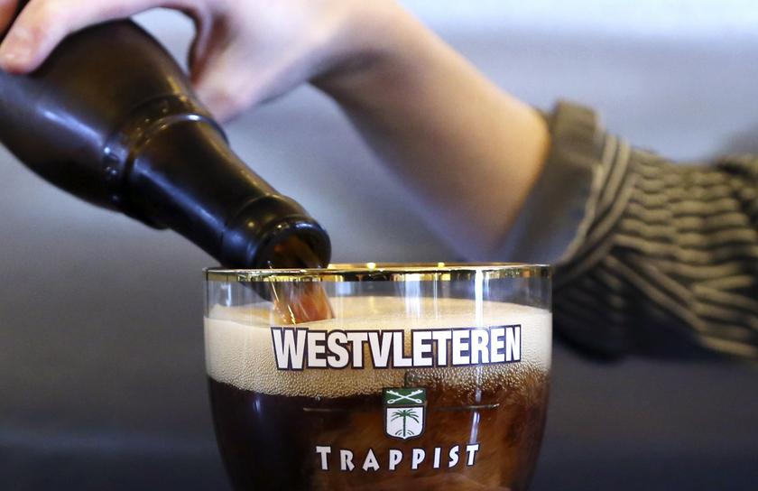 An employee pours a Westvleteren Trappist beer at the brewery in Westvleteren February 18, 2014. u00e2u20acu201d Reuters pic