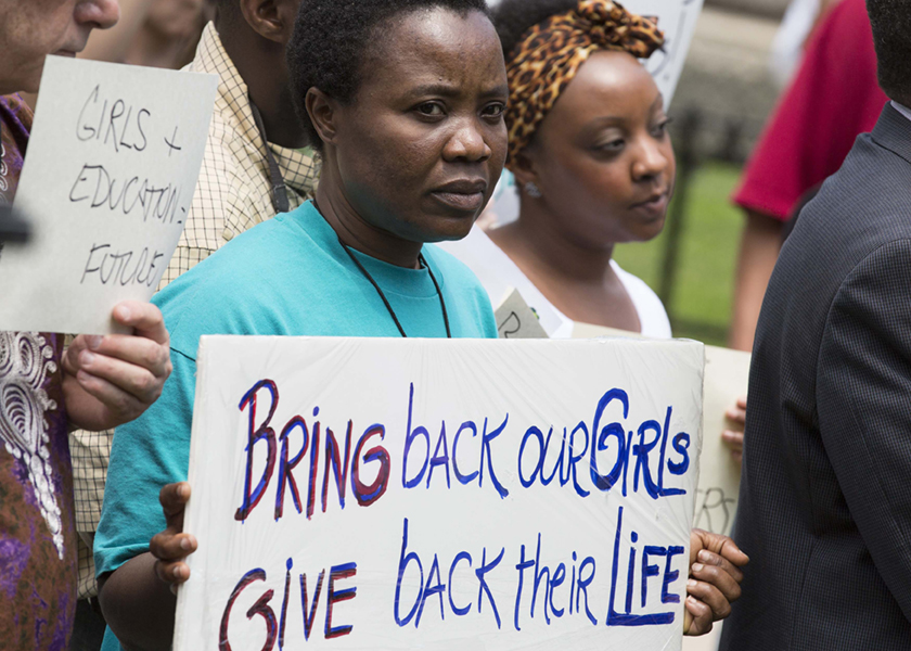 Women hold signs during a vigil held in the wake of the kidnapping of more than 200 Nigerian schoolgirls by the Islamist militant group Boko Haram, in Washington, May 9, 2014. u00e2u20acu201d Reuters pic