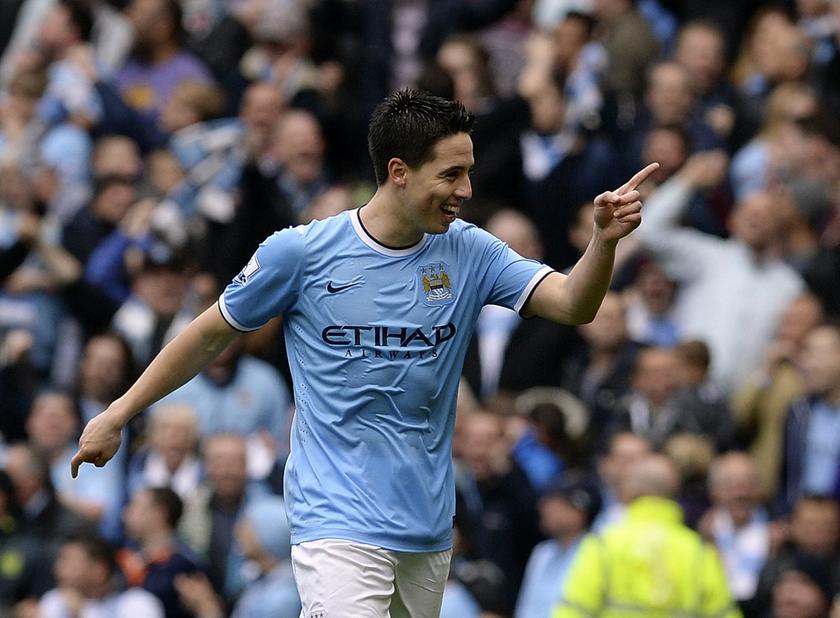 Manchester Cityu00e2u20acu2122s Samir Nasri celebrates after scoring during a football match at the Etihad Stadium in Manchester, northern England, May 11, 2014. Nasri was left out of the World Cup bound French national football squad. u00e2u20acu2022 Reuters pic