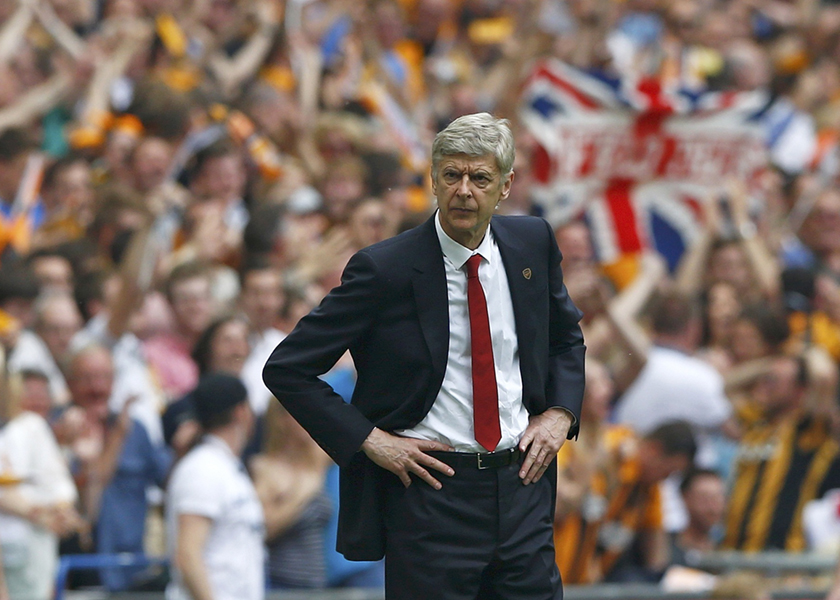 Arsenal Manager Arsene Wenger watches from the touchline during their FA Cup final soccer match against Hull City at Wembley Stadium in London, May 17, 2014. u00e2u20acu201d Reuters pic