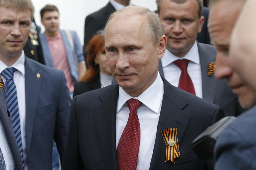 Russian President Vladimir Putin (centre) walks during events marking Victory day in Sevastopol May 9, 2014. u00e2u20acu201d Reuters pic