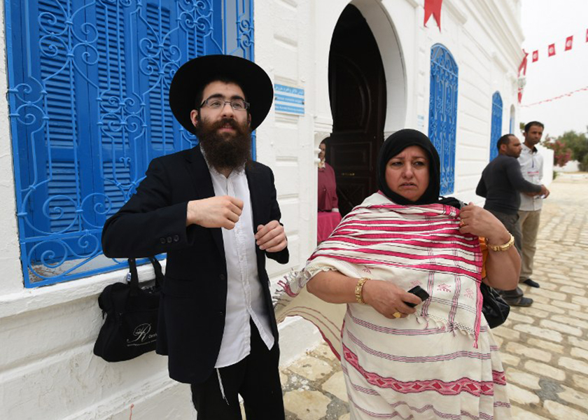 Pilgrims arrived at Tunisia's Ghriba synagogue, the oldest in Africa, expressing hope that this year would mark a turning point for the ritual despite a rise in Islamist unrest since the 2011 revolution, May 18, 2014. u00e2u20acu201d AFP pic