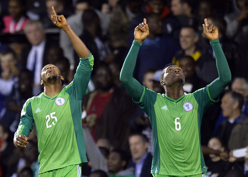 Nigeria's Michael Uchebo (left) celebrates scoring against Scotland with teammate Azubuike Egwuekwe during their international friendly soccer match at Craven Cottage in London May 28, 2014. u00e2u20acu201d Reuters pic