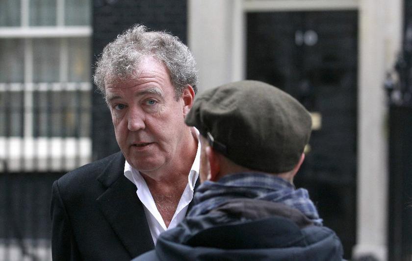 BBC programme ,Top Gear, presenter Jeremy Clarkson with a member of his crew filming outside 10 Downing Street in London November 29, 2011 Reuters
