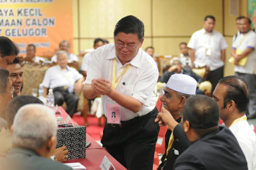 Parti Cinta Malaysia (PCM) candidate Huan Cheng Guan is seen at the Bukit Gelugor by-election nomination centre, May 12, 2014. u00e2u20acu201d Picture by K.E. Ooi
