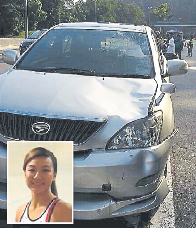 The car that allegedly struck national triathlete Kimbeley Yap (inset) on the Penchala Link May 28, 2014. u00e2u20acu201d Malay Mail pic