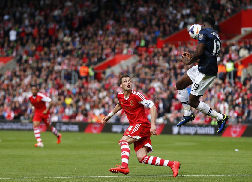 Manchester Unitedu00e2u20acu2122s Danny Welbeck (right) heads the ball as Southamptonu00e2u20acu2122s Morgan Schneiderlin looks on during their EPL match at St Maryu00e2u20acu2122s Stadium in Southampton, May 11, 2014.