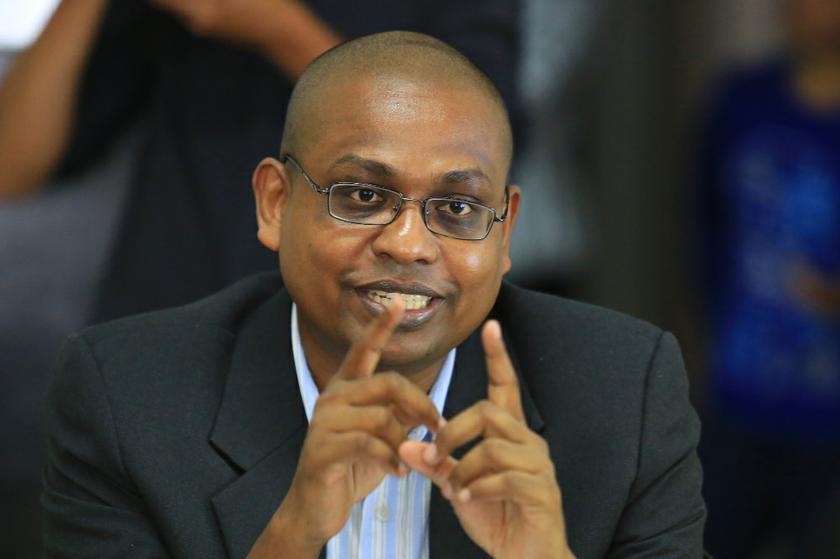 Praba Ganesan speaks to reporters about Kuasa's report card on May 7, 2014. u00e2u20acu201d Picture by Saw Siow Feng