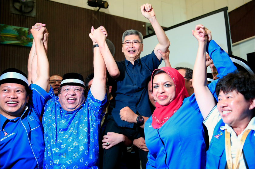 Datuk Mah Siew Keong is hoisted up as fellow Barisan Nasional members celebrate his win in Teluk Intan, on May 31, 2014. u00e2u20acu201d Picture by Saw Siow Feng