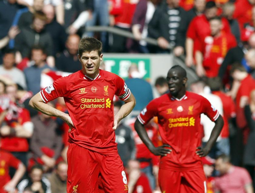 Liverpoolu00e2u20acu2122s Steven Gerrard (left) and Mamadou Sakho react during their EPL home match 2-0 loss against Chelsea, April 27, 2014. u00e2u20acu201d Reuters pic