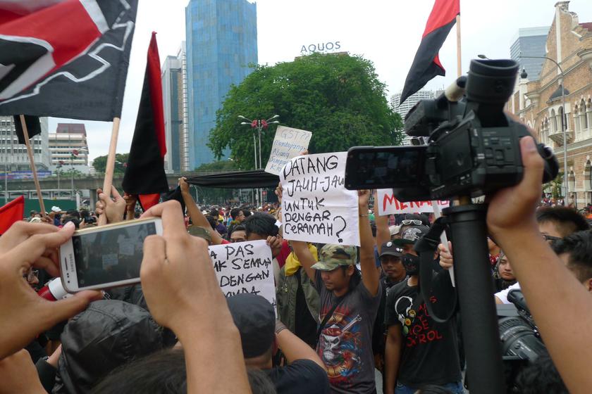 Protesting youths that were involved in an altercation with PAS volunteers during the May Day rally at Merdeka Square in Kuala Lumpur, May 1, 2014. u00e2u20acu201d Picture by Pathma Subramaniam