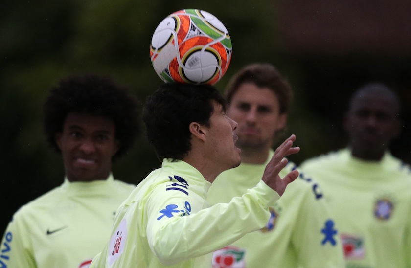 Brazil's national team player Hernanes heads the ball as he and his teammates play futevolei near Rio de Janeiro May 29, 2014. u00e2u20acu201du00c2u00a0Reuters pic