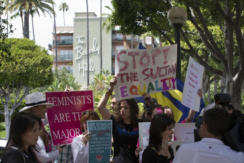 People protest outside the Beverly Hills Hotel, which is owned by the Sultan of Brunei, over Brunei's strict shariah law penal code in Beverly Hills, California May 5, 2014. u00e2u20acu2022 Reuters picn
