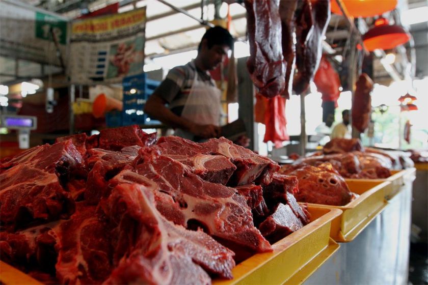 A butcher is seen cutting up meat at the Pasar Borong Selangor in Seri Kembangan, Selangor. u00e2u20acu2022 Picture by Yusuf Mat Isa 