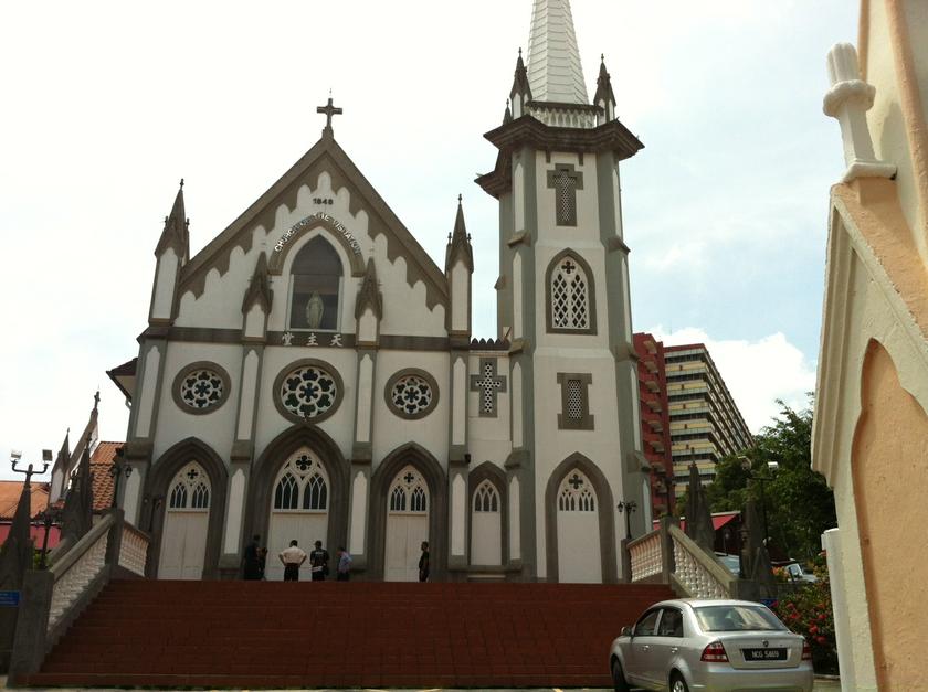 Officers from the forensics department examine site of the attack outside the Church of Visitation in Seremban, on May 15, 2014. u00e2u20acu2022 Picture by Boo Su-Lyn