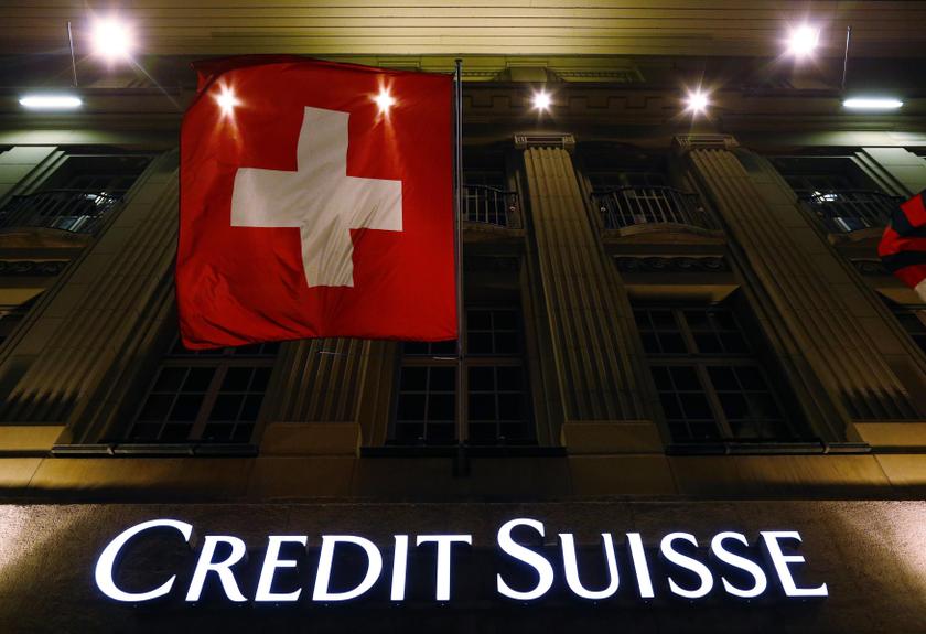 The logo of Swiss bank Credit Suisse is seen below the Swiss national flag at a building in the Federal Square in Bern May 16, 2014. The banking group is expected to plead guilty and pay more than US$2.5 billion to US authorities. u00e2u20acu201d Reuters pic