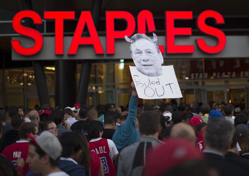 A photo cut-out of Los Angeles Clippers owner Donald Sterling is seen among people standing in line for the NBA game between Golden State Warriors and L.A. Clippers at Staples Center in Los Angeles, April 29, 2014. u00e2u20acu201d Reuters pic