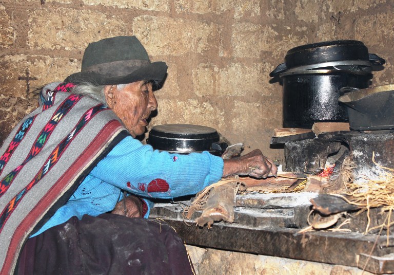 Handout picture by the Peruvian Ministry of Development and Social Inclusion of 116-year-old Filomena Taipe Mendoza, reportedly born on December 20, 1897, eating at her humble home on April 30, 2014 in Huancavelica, 440 km east of Lima. u00e2u20acu201d AFP pic