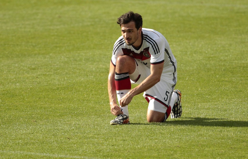 German national player Mats Hummels puts on his shoes during a test match against the German U20 team in St. Martin, northern Italy, May 25, 2014.  u00e2u20acu201du00c2u00a0Reuters pic