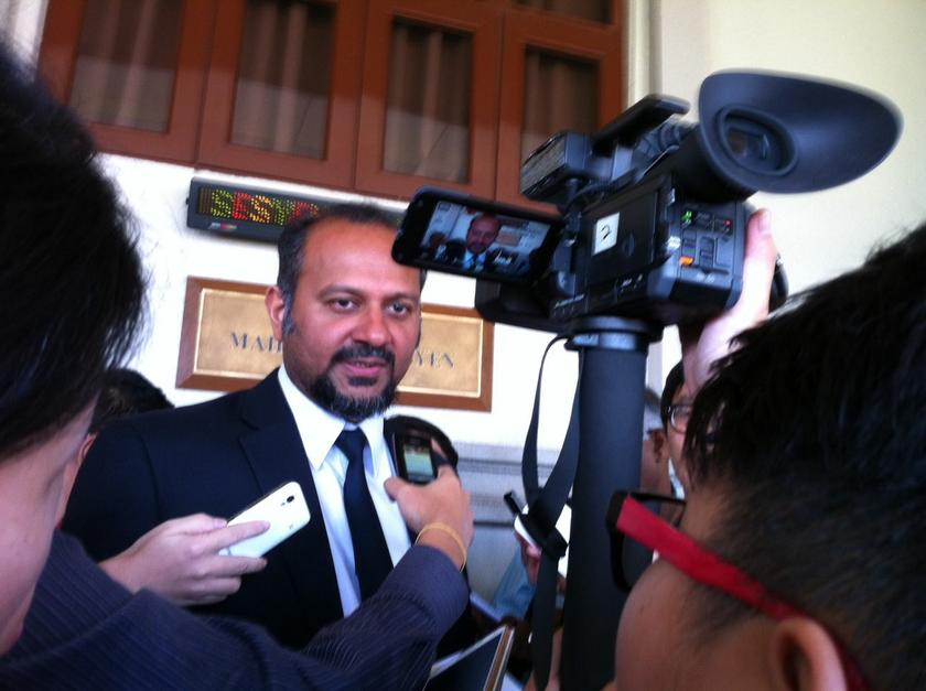 Lawyer Gobind Singh Deo speaks to reporters after the hearing of three activists who were re-charged under the Peaceful Assembly Act (PAA), May 9, 2014. u00e2u20acu2022 Picture by Boo Su-Lyn