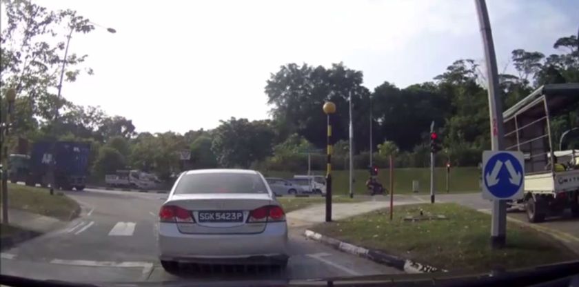 A videograb of the Honda Civic driven by Quek Zhen Hao, who was arrested for driving aggresively. 