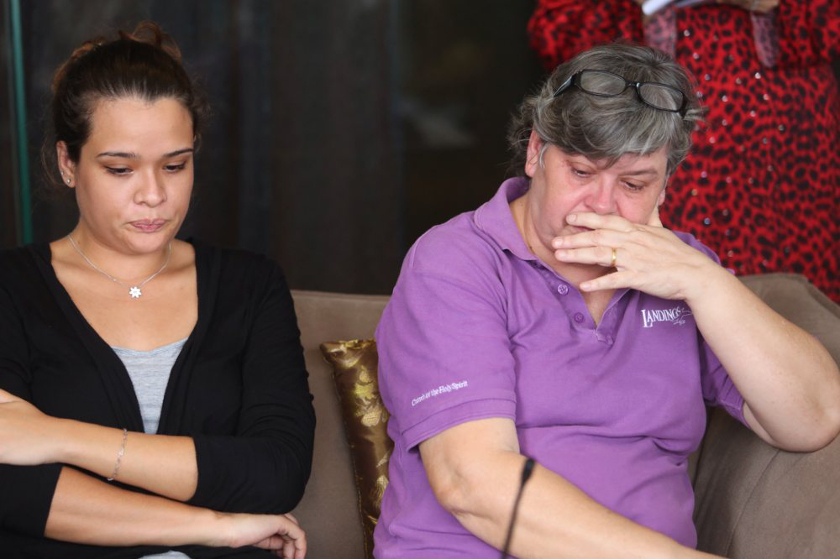 MH370 inflight supervisor Patrick Gomes' wife Jacquita Gonzales, seen here with their daughter Nicolette Gomes, said the latest news on the MH370 search made her feel like it's 'March 8 all over again', on May 30, 2014. u00e2u20acu201d Picture by Choo Choy May