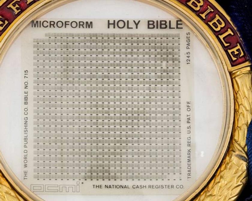 A 1.5 inch by 1.5 inch (3.8 cm by 3.8 cm) microfilm Bible which can be read with the help of a microscope is seen in an undated handout picture from Heritage Auctions. u00e2u20acu2022 Reuters pic