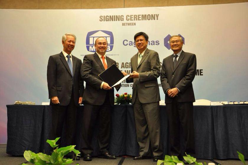 (From left) Chairman of MBSB, Tan Sri Abdul Halim Ali, Ahmad Zaini, Chung and Cagamas chairman, Datuk Ooi Sang Kuang at the signing ceremony. u00e2u20acu201d Malaysia Building Society pic