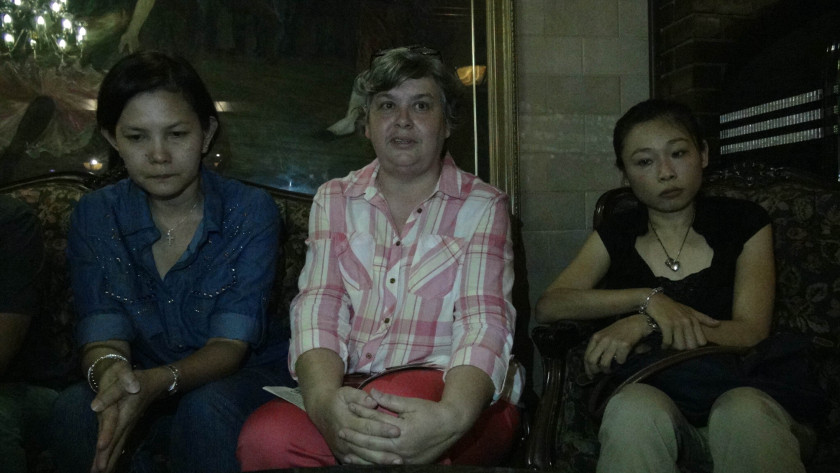 (From left) Flight MH370 chief steward Andrew Nari's wife Melanie Antonio, in-flight supervisor Patrick Gomes' wife Jacquita Gonzales, and Elaine Chew on May 18, 2014. u00e2u20acu201d Picture by Pathmawathy Subramaniam