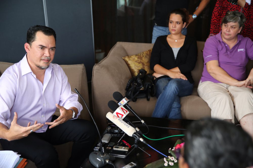 (From left) Nufam president Ismail Nasaruddin, MH370 inflight supervisor Patrick Gomes' daughter Nicolette Gomes, and Gomes' wife Jacquita Gonzales at a press conference at Empire Hotel Subang, on May 30, 2014. u00e2u20acu201d Picture by Choo Choy May