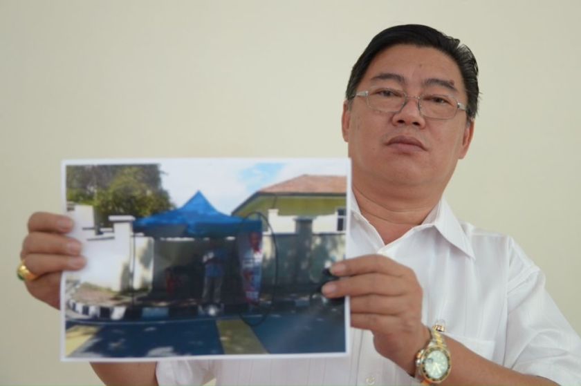 Parti Cinta Malaysia Vice President Huan Cheng Guan alleged that DAP had campaigned within the polling stations on Sunday, the polling day for the Bukit Gelugor by-election, May 27, 2014. u00e2u20acu2022 Picture by K.E. Ooi