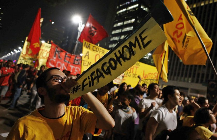 A demonstrator blows a horn during a protest against the 2014 World Cup, in Sao Paulo May 15, 2014. Brazilian football great Pele said protests and stadium delays are putting the World Cup next month at risk. u00e2u20acu201d Reuters pic
