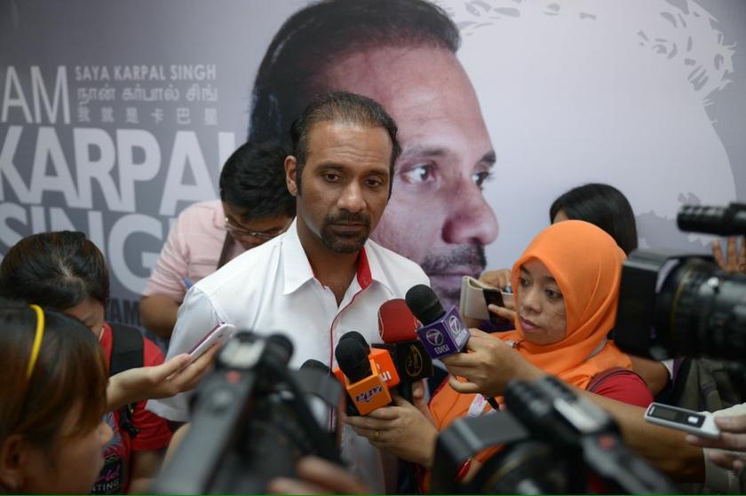 DAP Bukit Gelugor candidate Ramkarpal Singh talks to reporters after the announcement of the DAP candidate for the Bukit Gelugor by-election. u00e2u20acu2022 Picture by K.E. Ooi