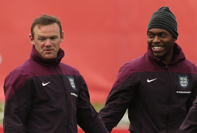 Englandu00e2u20acu2122s Daniel Sturridge (right) laughs with teammate Wayne Rooney during a training session at the St Georgeu00e2u20acu2122s Park training complex near Burton-upon-Trent, England, May 27, 2014. u00e2u20acu201d Reuters pic