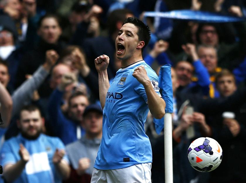 Manchester Cityu00e2u20acu2122s Samir Nasri celebrates after scoring against West Ham United at the Etihad Stadium in Manchester, May 11, 2014. u00e2u20acu201d Reuters pic